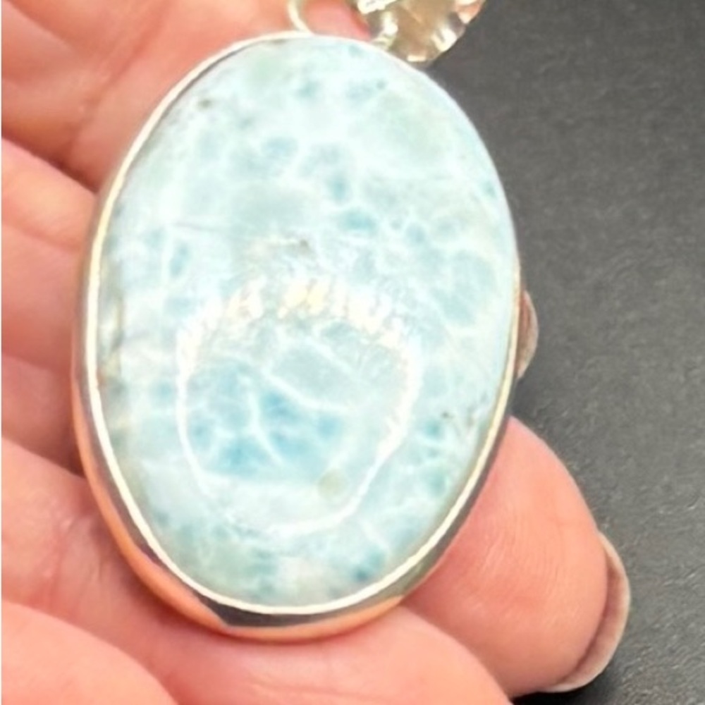 A Lg Larimar stone in a Sterling Silver setting